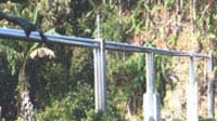 View of R.C.C. Posts with G.I. Pipes crossing over stream